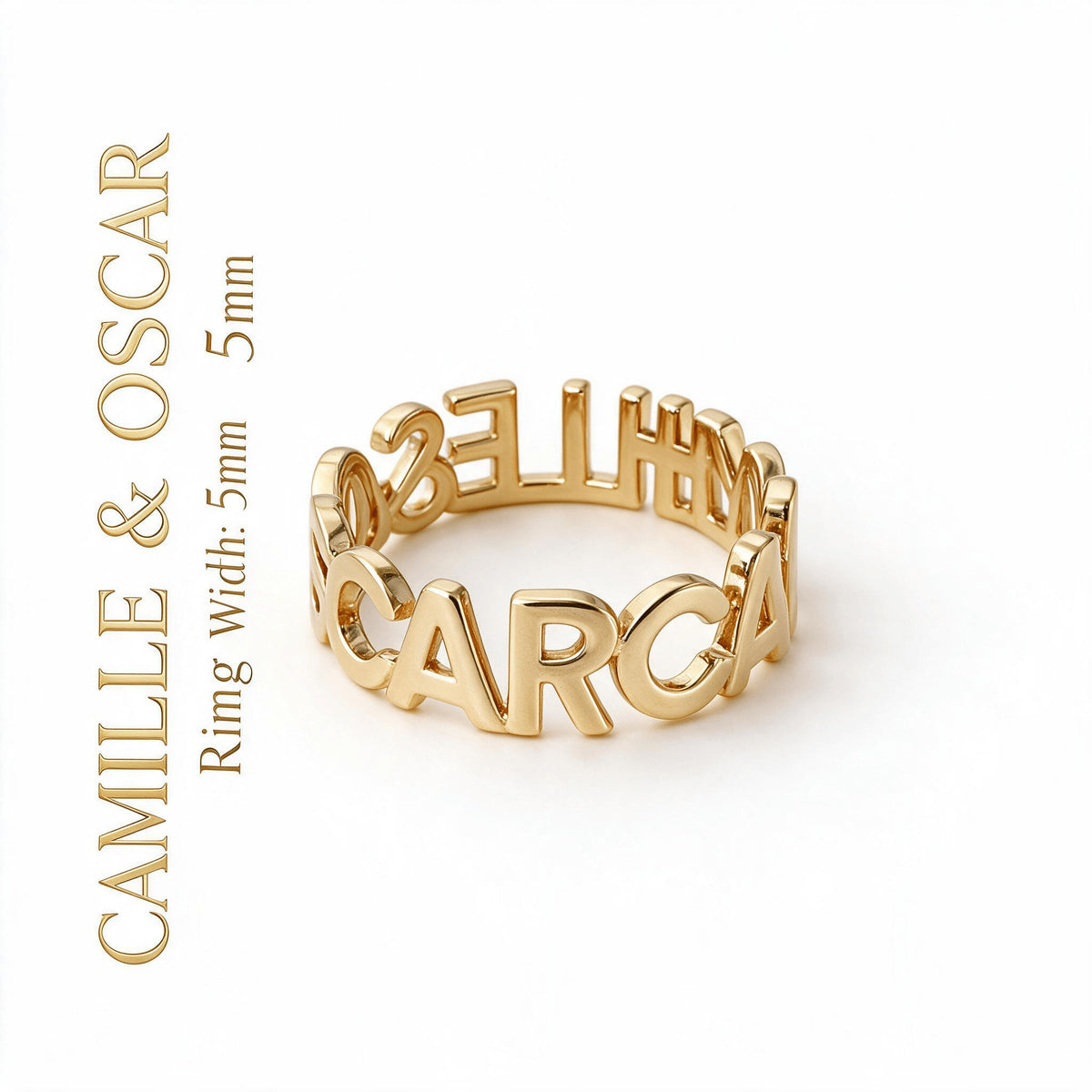 Close-up of a gold-tone cutout name loop ring showing its continuous letter design and 5 mm width label.