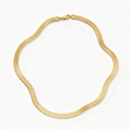 Flat gold-tone herringbone necklace laid in a curve to show the full chain and clasp.