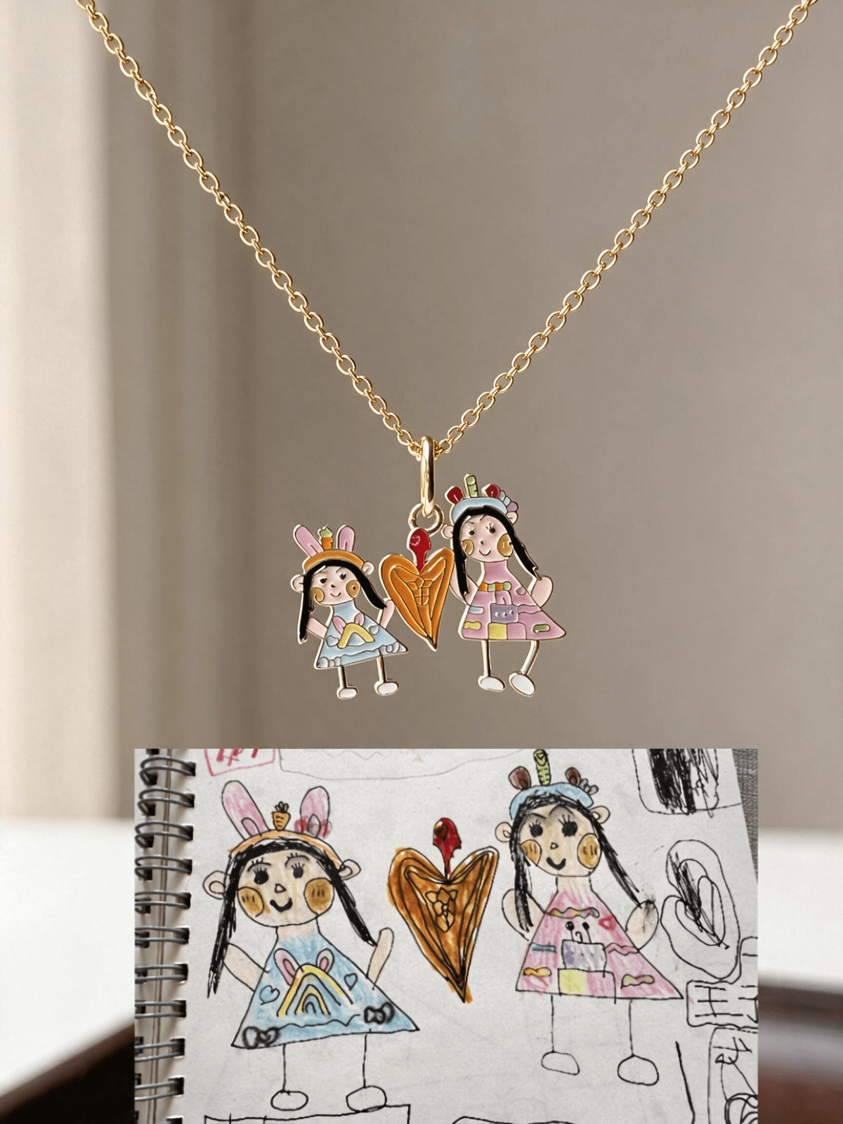 Two colorful child-drawn figures and a heart made into a pendant, displayed above the original drawing.