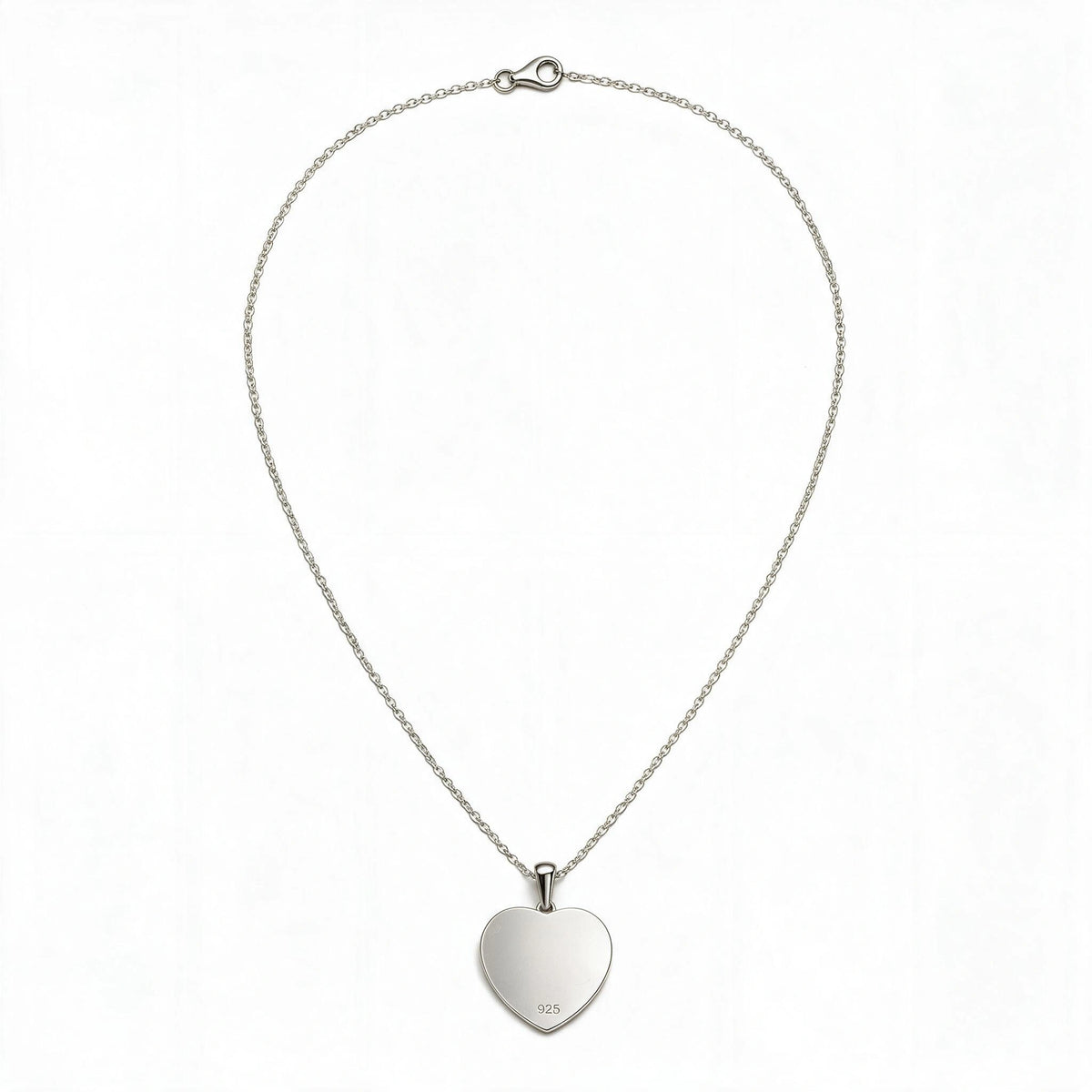 Back view of a silver-tone heart pendant necklace with the full chain and clasp