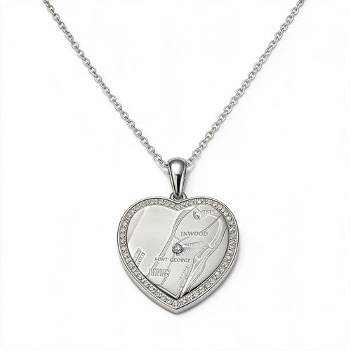 Silver-tone heart pendant necklace with a map design and a sparkling border