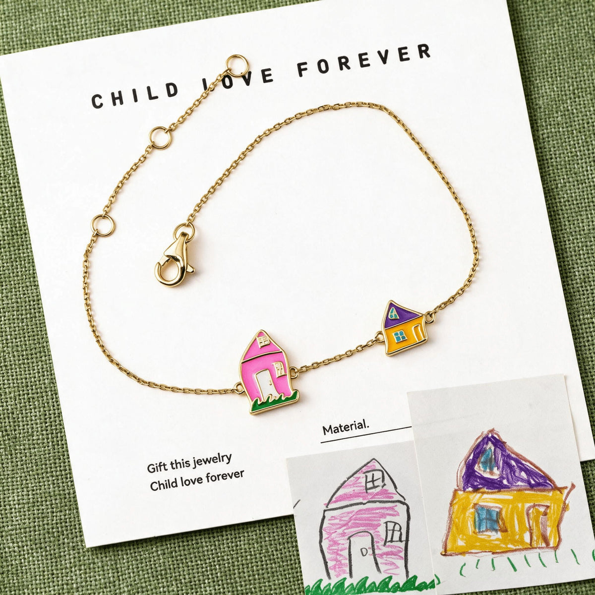 Adjustable gold-tone bracelet with two enamel house charms beside the original drawings.