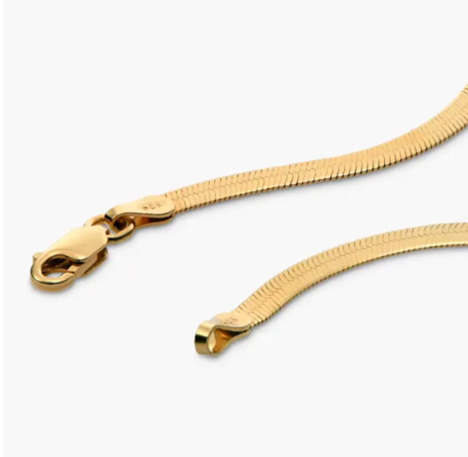 Close-up of the herringbone chain ends, lobster clasp and connector.
